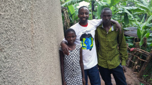 Jean de Dieu Tuyisenge (centre) in Rwanda with a couple of the young people benefitting from his charity, EduAfrica, which educates and empowers African youth and women.   
